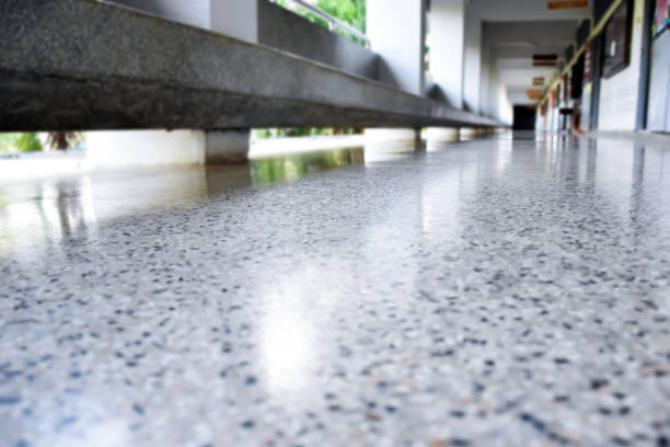 Concrete Polishing in San Angelo, TX in progress as a crew smooths a retail floor