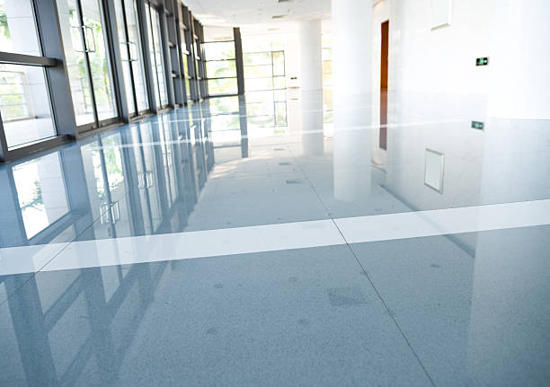 Concrete Polishing in Annetta, TX underway as a technician refines a residential garage floor
