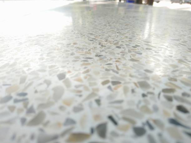 Concrete Polishing in Aledo, TX underway as a technician refines a residential garage floor