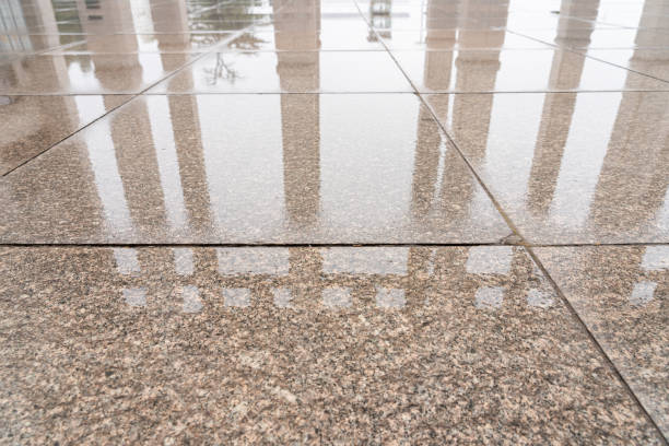 Technician performing Concrete Polishing on an interior slab inside an Aledo, TX workshop