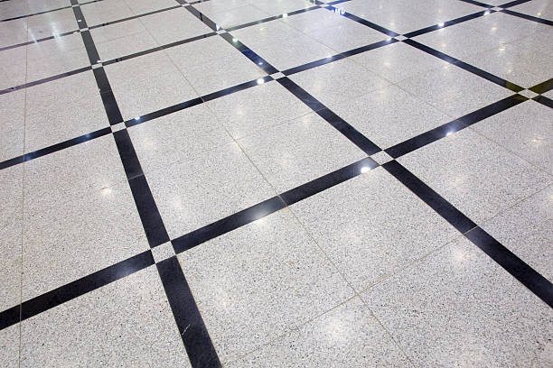 Concrete Polishing in Slaton, TX underway as a technician refines a residential interior floor